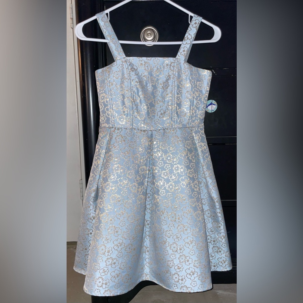 Speechless Floral Kids Dress
The colors are a shimmery gold and light blue.